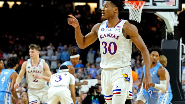 Kansas Jayhawks guard Ochai Agbaji (30) reacts after a play against the North Carolina Tar Heels during the 2022 NCAA men's basketball tournament Final Four championship game at Caesars Superdome. Mandatory Credit: Robert Deutsch-USA TODAY Sports